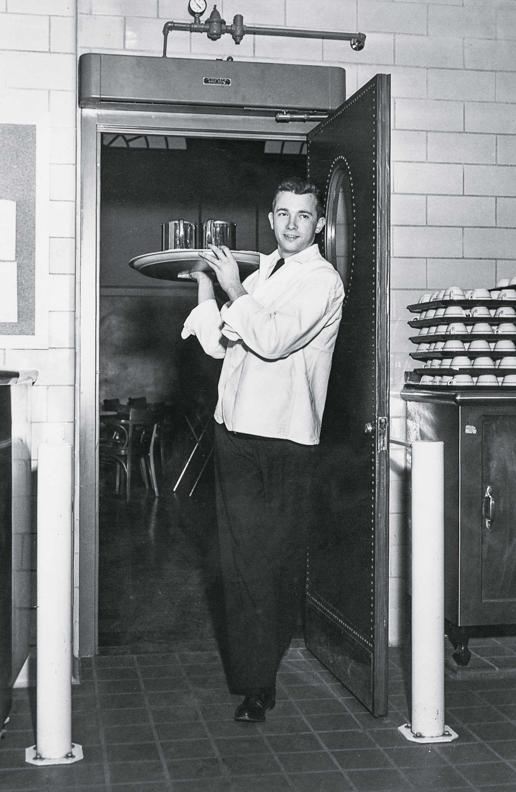 waiter with a full tray at the Ratty 1950s